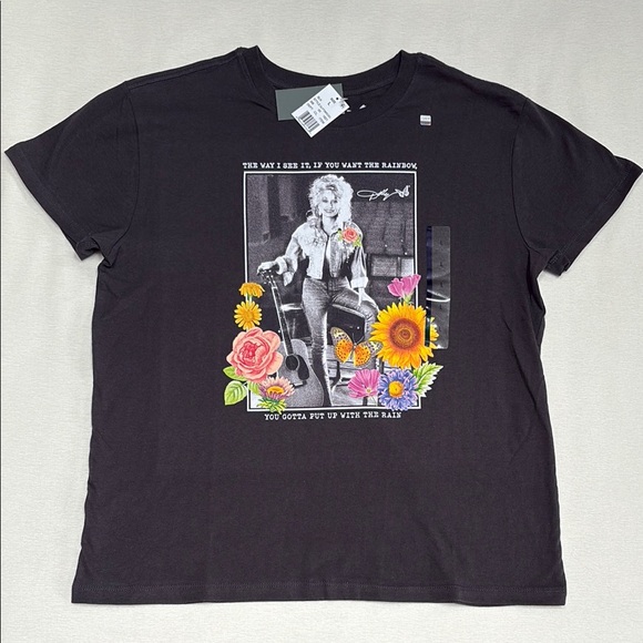 Dolly Tops - Dolly Parton Authentic shirt with big front photo and graphics.